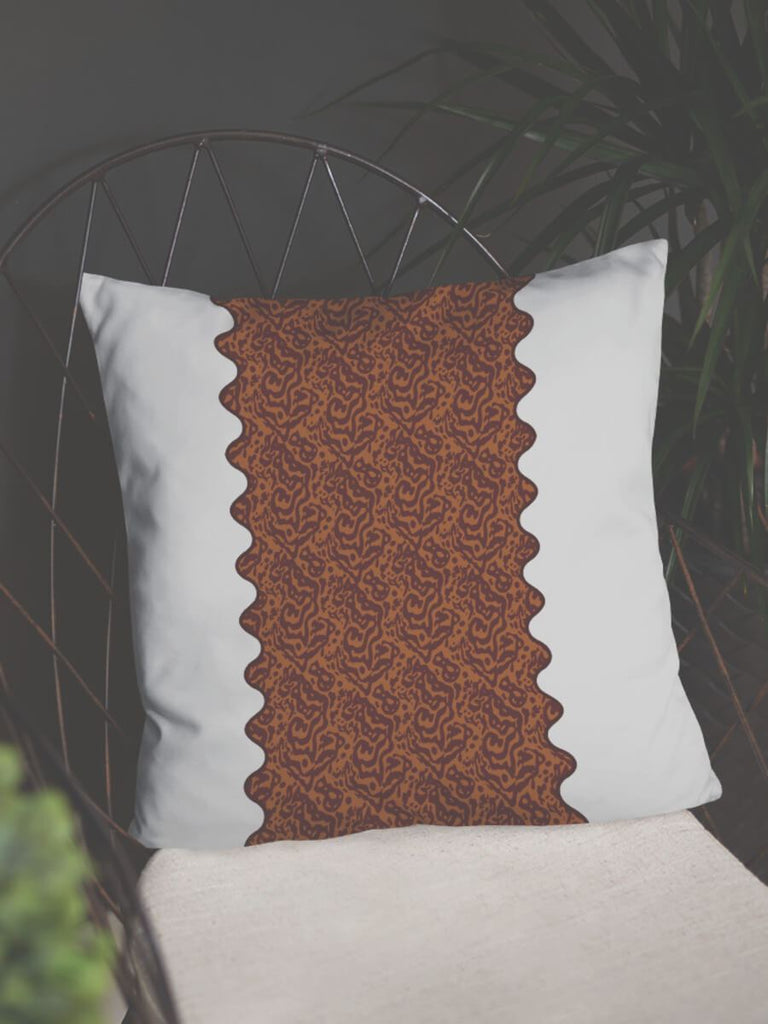 18x18 square white throw pillow with Glenie’s Chromodoris scalloped design as a stripe in the middle of the pillow.