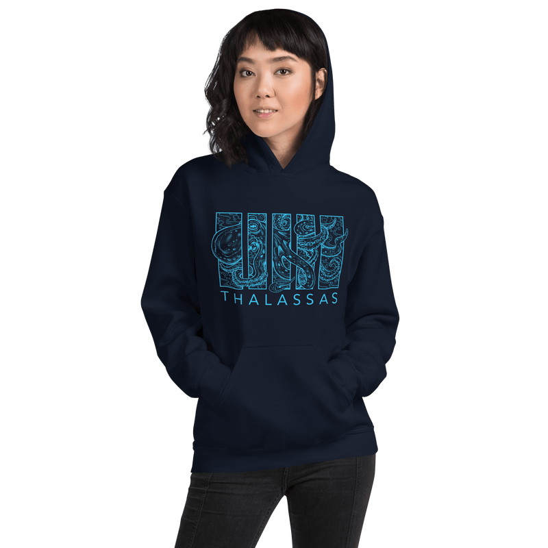 a woman wearing navy hoodie with light blue drawing of an octopus with Thalassas text below