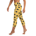 Left side view of person wearing Blue-Ringed Octopus capri yoga leggings.
