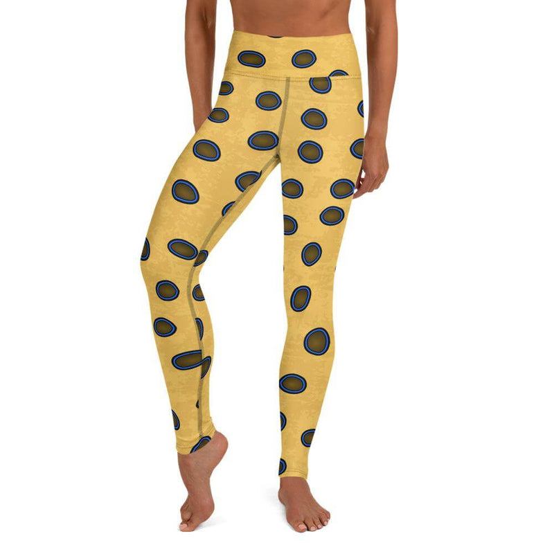 A person wearing Blue-Ringed Octopus yoga leggings with a yellow background and brown spots outlined in dark blue.