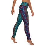Right side view of leggings with crocea clam pattern featured on right leg.