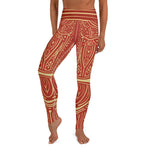 A person wearing reddish orange Dancing Shrimp yoga leggings with light yellow pattern inspired by the dancing shrimp.