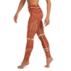 Left side view of woman wearing the Dancing Shrimp yoga leggings.