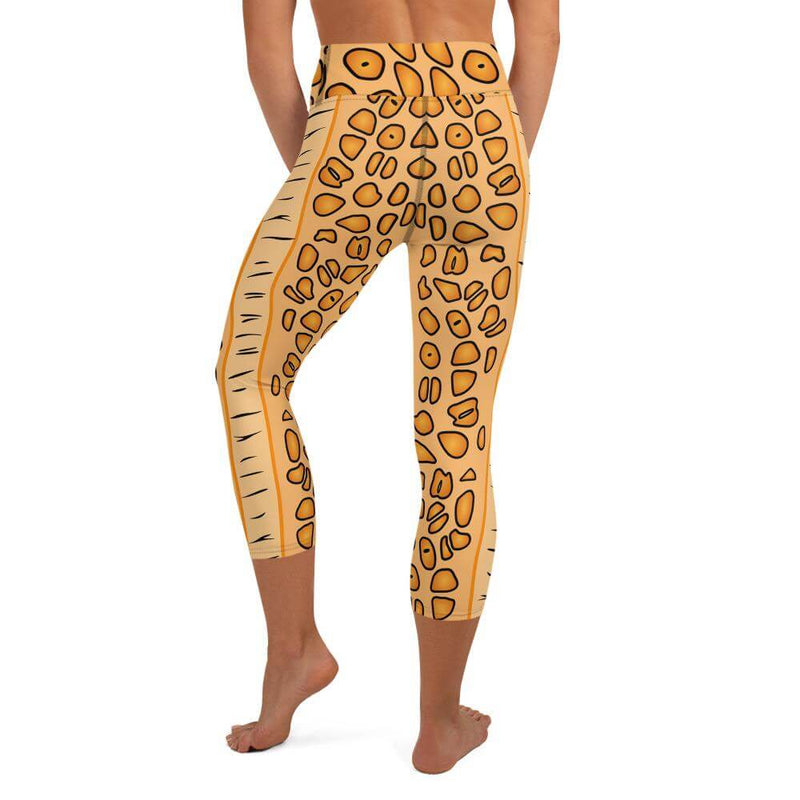 Back view of person in the Flamingo Tongue Snail capri yoga leggings with overall spotted pattern on legging and waistband.