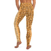 Back view of person in the Flamingo Tongue Snail leggings with overall spotted pattern on legging and waistband.