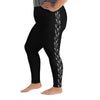 A person in size 2XL black leggings with a hammerhead shark pattern on the left leg, plus sized leggings