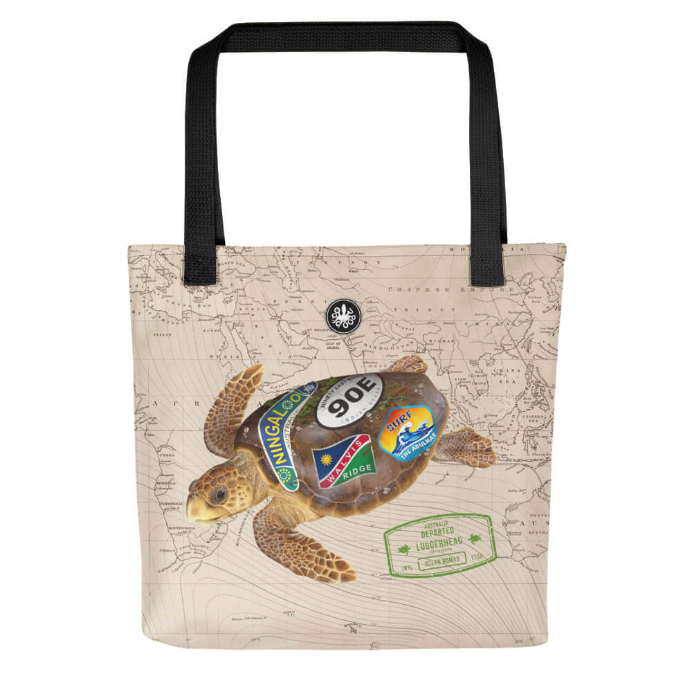 Loggerhead Turtle Ocean Nomad Tote Bag, black handles, Thalassas log at top and turtle swimming across a map in background.