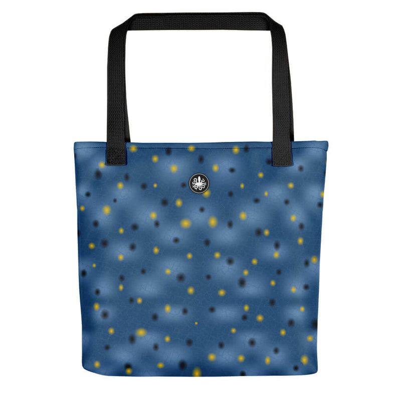 Tote bag in shades of blue, with black, yellow small dots, inspired by the Painted Infurcata, Thalassas logo at top of bag.