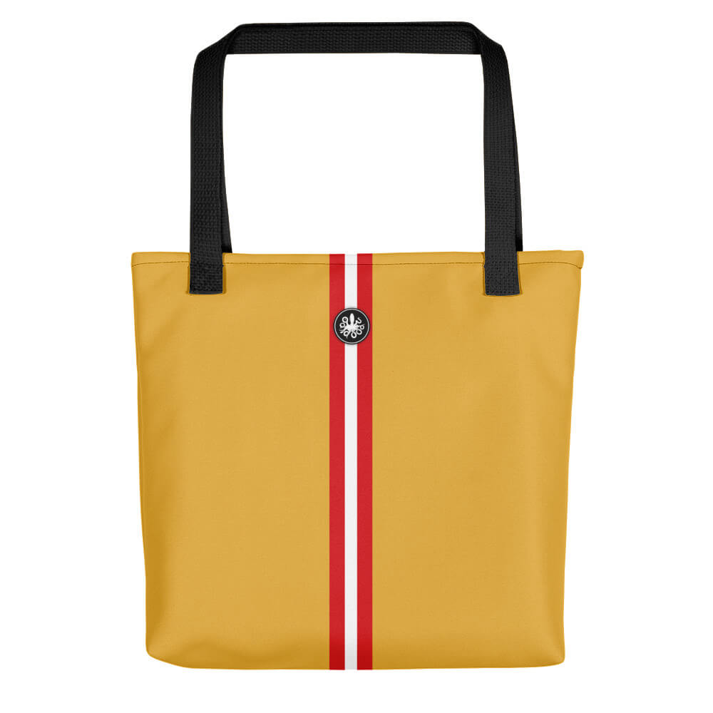 Yellow tote bag with red and white stripe down the middle and Thalassas logo at top, pattern inspired by Skunk Cleaner Shrimp.