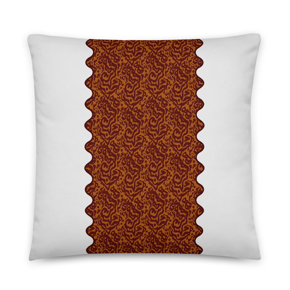 White throw pillow Glenie’s Chromodoris inspired pattern stripe in the center with burnt orange and orange, pillow size 18x18.