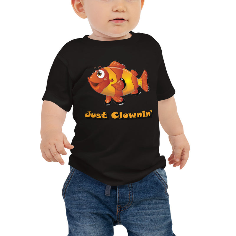 Baby wearing a short sleeve baby jersey tee in color black in size 6-12m with just clownin design.