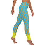Right side view person in Harlequin Filefish leggings.