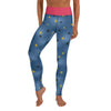 A person wearing blue yoga leggings, small black and yellow dots, pink waistband inspired by the painted infrucata sea slug.