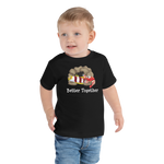 Toddler wearing a black short sleeve t-shirt with Red-banded goby and candy stripe pistol shrimp friendship design, size 2T. 