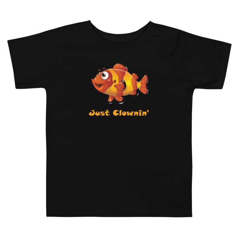 Just clownin’ toddler short sleeve t-shirt, color black, with smiling clownfish design and words just clownin under fish.