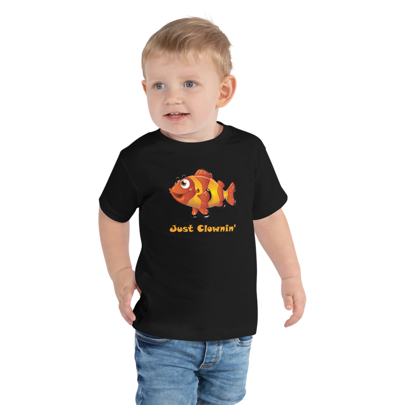 Toddler wearing a black short sleeve t-shirt with Just clownin’ design in size 2T. 