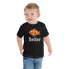 Toddler wearing a black short sleeve t-shirt with clownfish design in size 2T. 