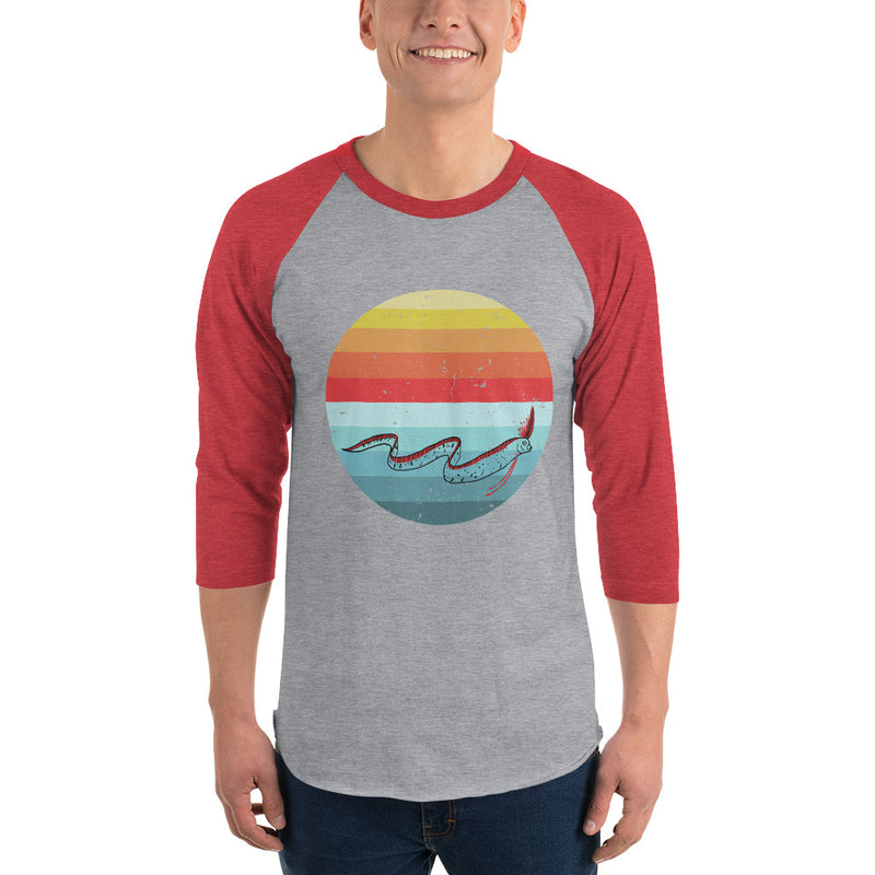 Person wearing ¾ sleeve raglan shirt with oarfish design, red sleeves, grey body, heather grey/heather red color option.