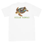 Loggerhead turtle ocean nomad short sleeve white t-shirt with Loggerhead turtle and words ocean nomad on back, size adult m.
