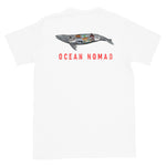 Gray whale ocean nomad short sleeve white t-shirt with whale and words ocean nomad on back, size adult m.