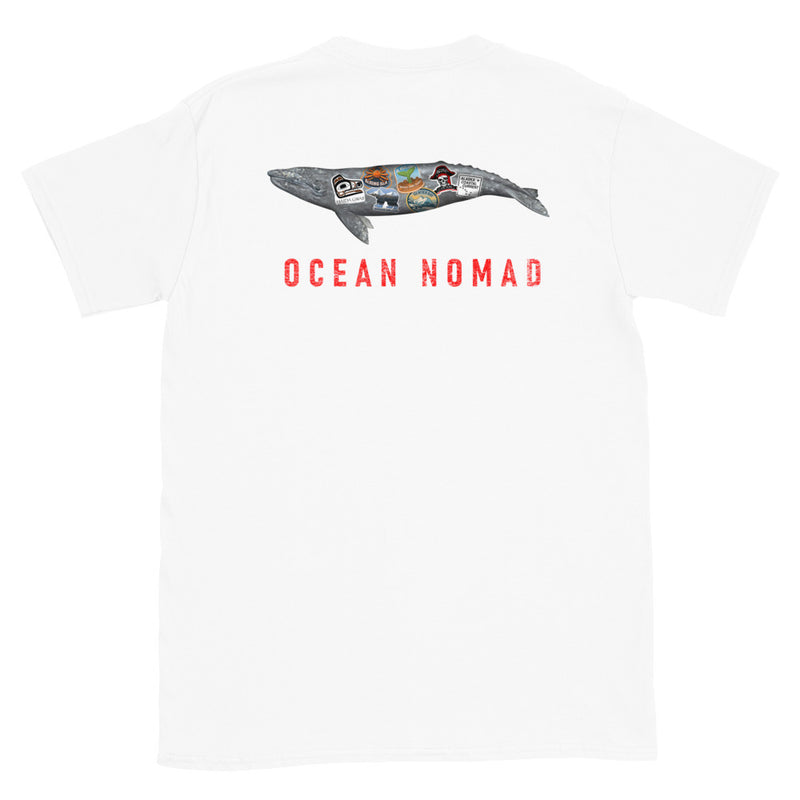 Gray whale ocean nomad short sleeve white t-shirt with whale and words ocean nomad on back, size adult m.