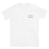 Loggerhead turtle ocean nomad short sleeve white t-shirt with loggerhead turtle and green travel stamp on front, size adult s.