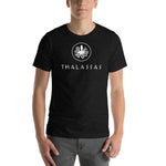 Person wearing a black heather short sleeve t-shirt with thalassas logo in adult size M.