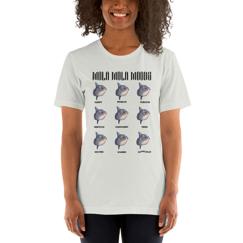 Person wearing a short sleeve t-shirt with mola mola moods design in color silver. 